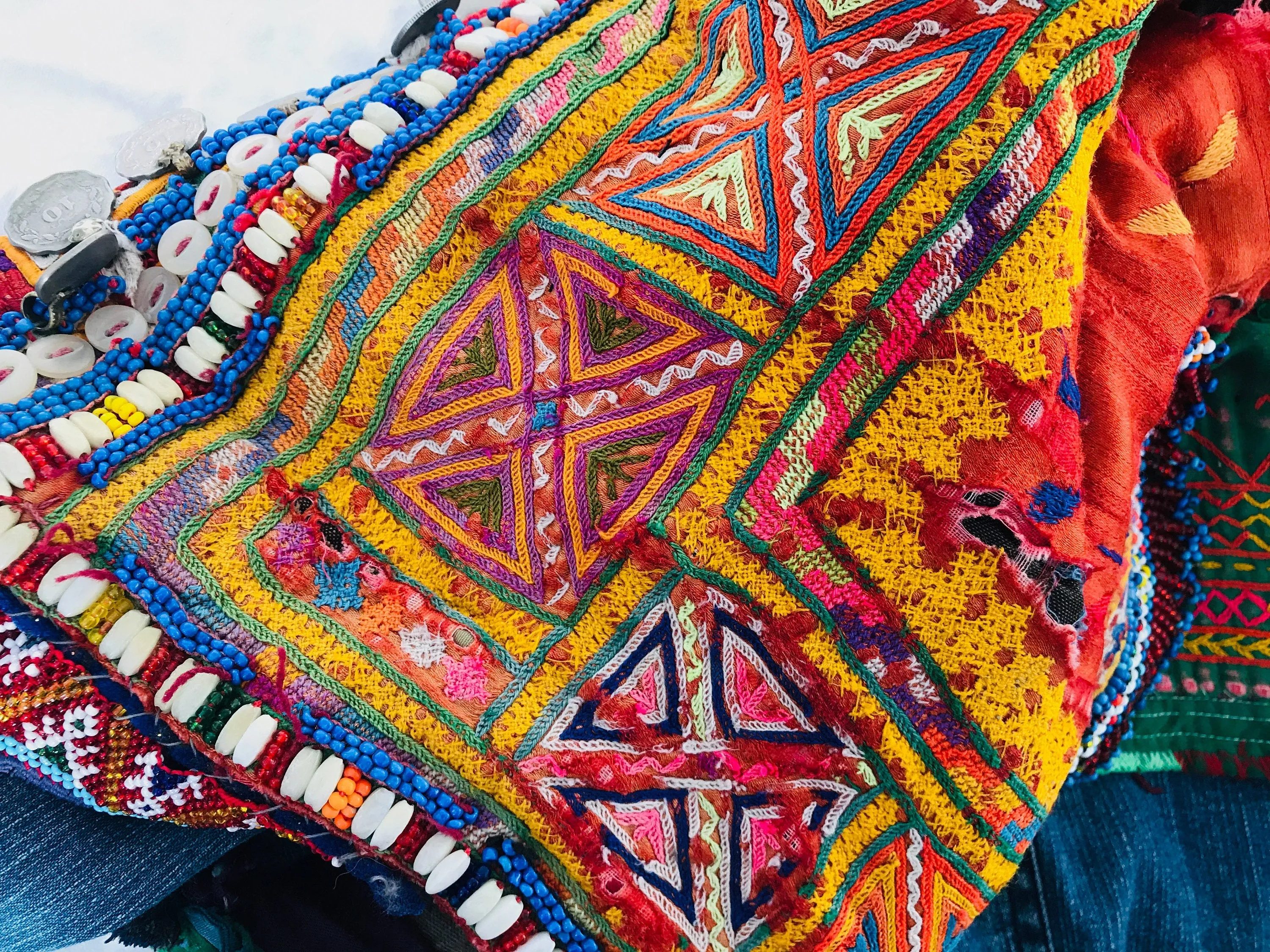 Vintage Balochi Repurposed Denim Jacket. Size M. Embroidered Beaded and Coined