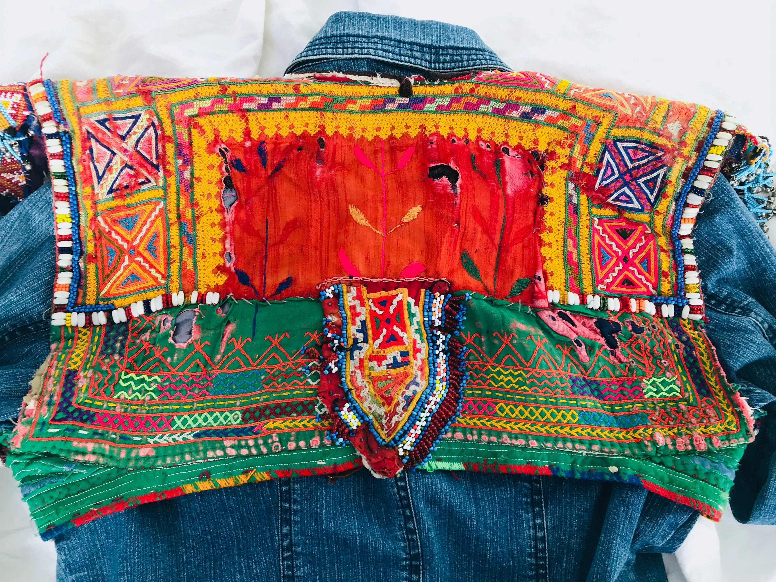 Vintage Balochi Repurposed Denim Jacket. Size M. Embroidered Beaded and Coined